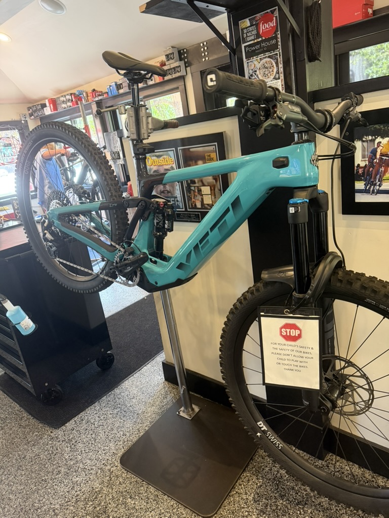 Turquoise Yeti mountain bike on display inside Power House